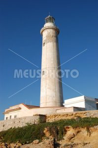 Capo Granitola lighthouse on the cliff - MeusPhoto